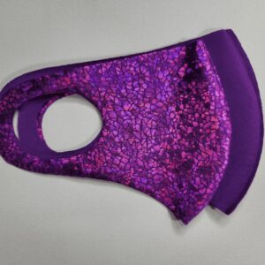 mask with a purple scale pattern