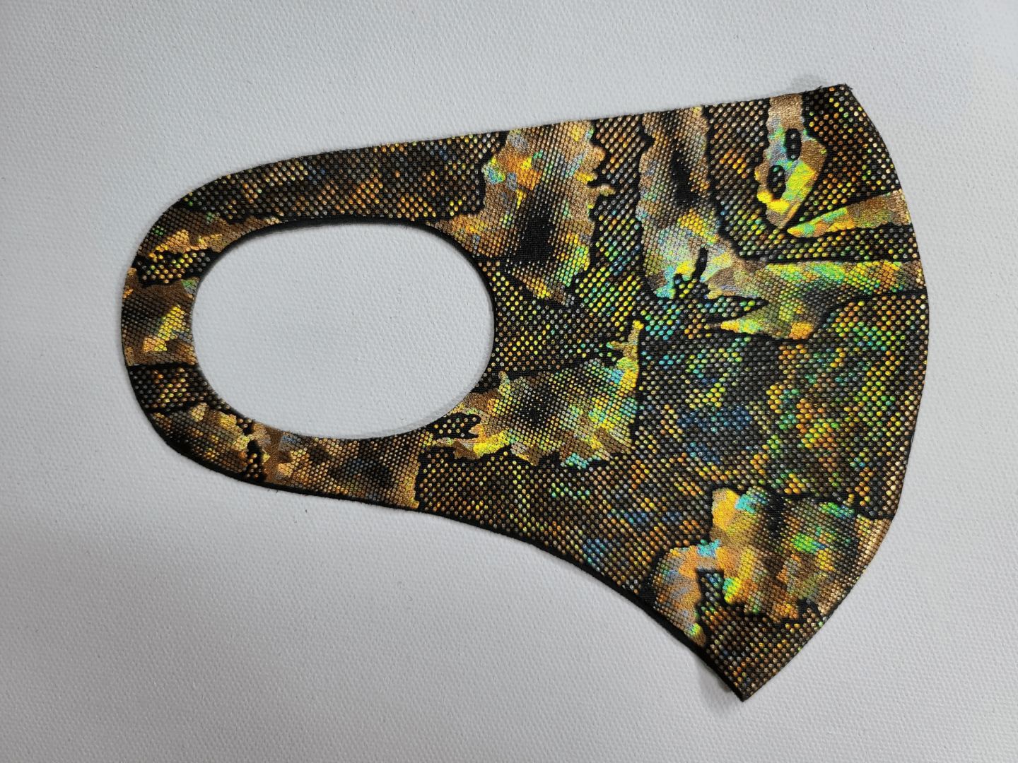 mask with a multicolor camoflauge pattern